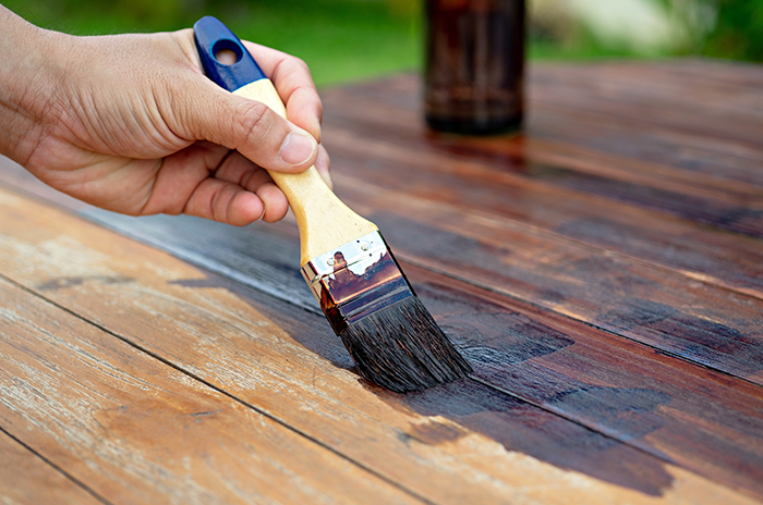 Deck maintenance includes periodic restaining